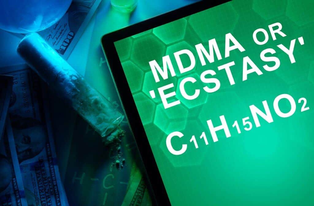 lighthousetreatment-a-complete-history-of-ecstasy-article-photo-tablet-with-the-chemical-formula-of-ecstasy-or-mdma-drugs-and-narcotics-250781656