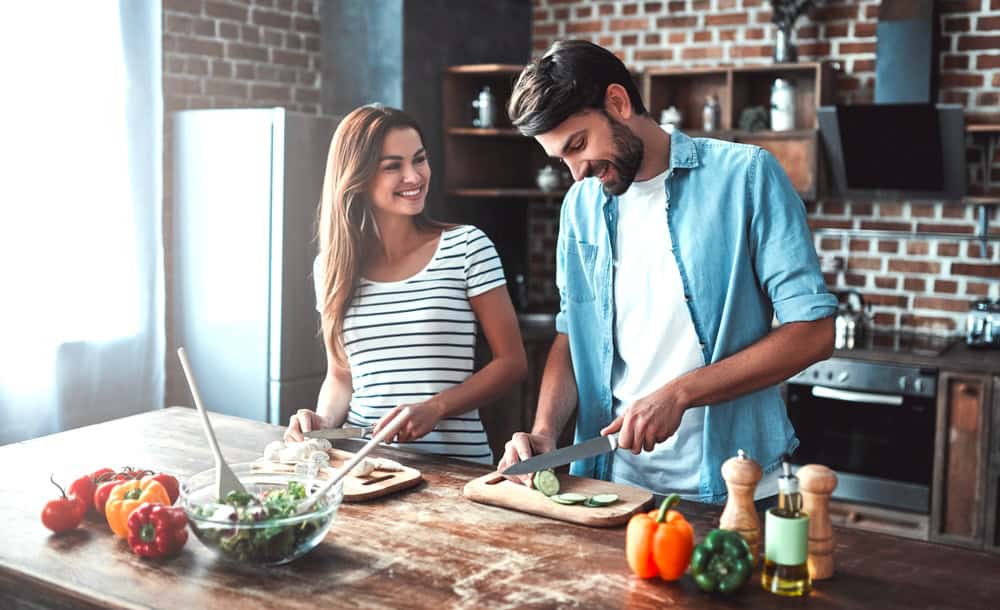 Couple cooking together for Valentine’s day