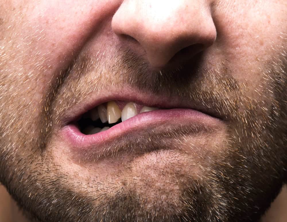 Closeup of a mouth moving from side to side