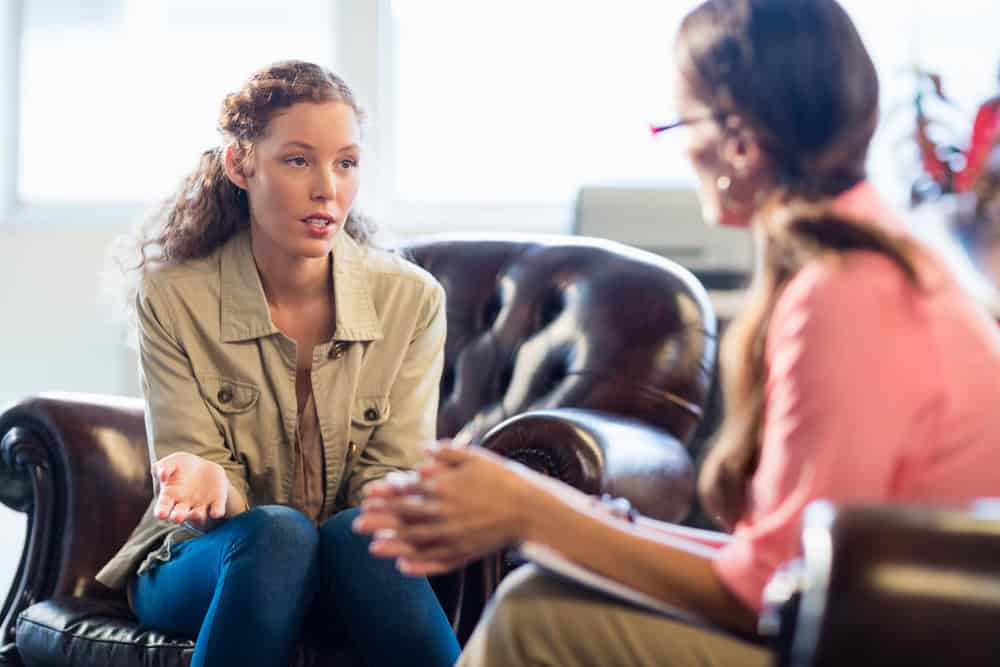 Woman consulting a rehab specialist in Anaheim for THC Detox
