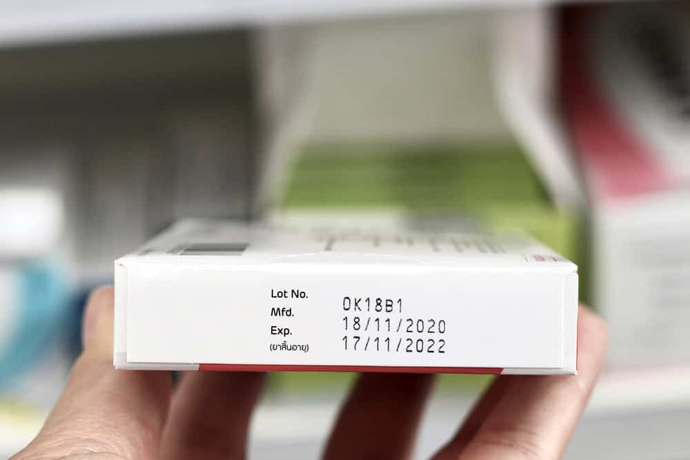 Closeup of drug medicine box expiration date 