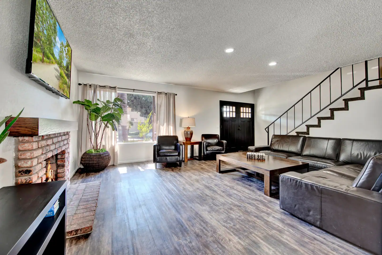 Residential Treatment living room staircase at Lighthouse Treatment in Orange County, CA